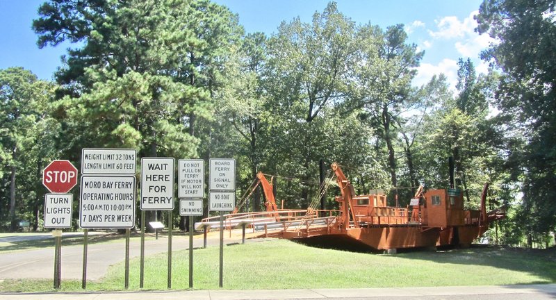 Replicas of signs at Moro Bay State Park add to the sense of what it was like to take the ferry across the Ouachita River. (Photo by Marcia Schnedler, special to the Democrat-Gazette)