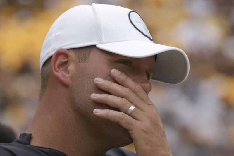Pittsburgh Steelers quarterback Ben Roethlisberger stands on the sideline as the team plays against the Seattle Seahawks in the second half of an NFL football game, Sunday, Sept. 15, 2019, in Pittsburgh. Roethlisberger's season is over. The Pittsburgh Steelers quarterback will undergo surgery on his right elbow and be placed on injured reserve, ending the 37-year-old's 16th season just two weeks in. Roethlisberger injured the arm late in the second quarter of Sunday's 28-26 loss to Seattle. (AP Photo/Gene J. Puskar)