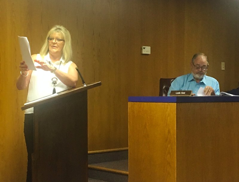 Amy Staten McNeil (left) of the South Arkansas Heritage Museum presents her case for a parking variance Monday to the Magnolia Planning Commission. Her request for fewer parking spaces than city code requires at the historic Henry Alvan Longino house in downtown Magnolia was ultimately granted after nearly an hour of talks. Also pictured is Commissioner Leslie Kent.