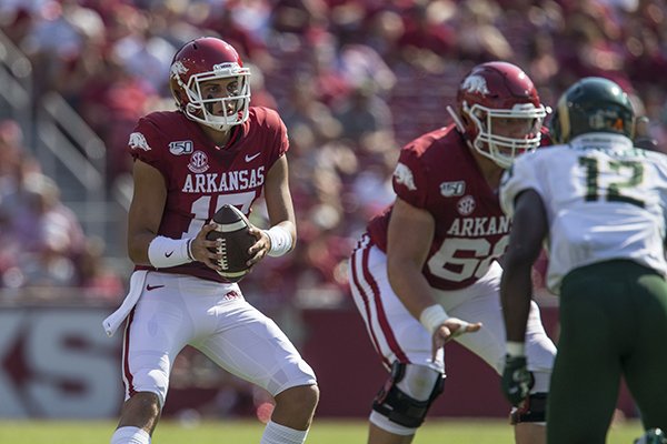 Arkansas quarterback Nick Starkel takes a snap during a game against Colorado State on Saturday, Sept. 14, 2019, in Fayetteville.