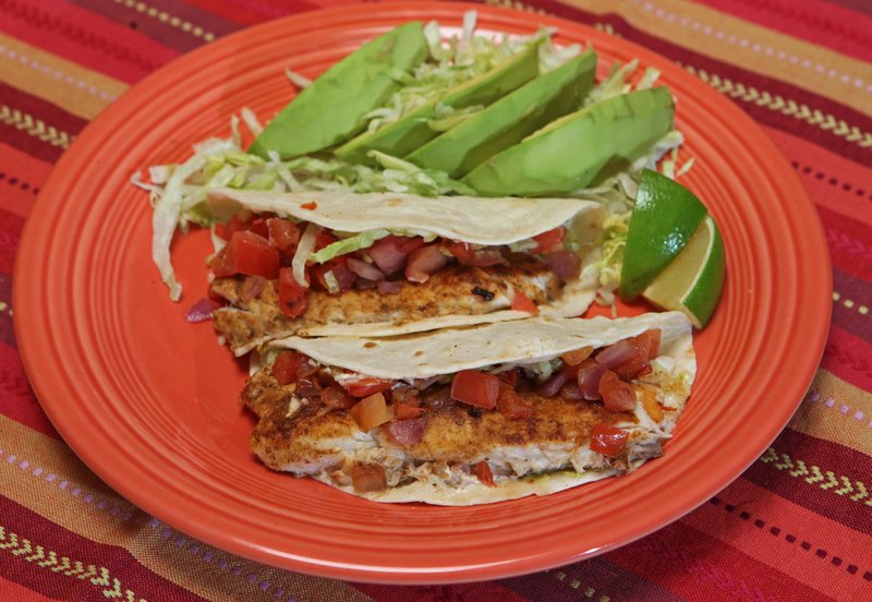 TNS/LINDA GASSENHEIMER Fish Tacos served with Avocado Salad