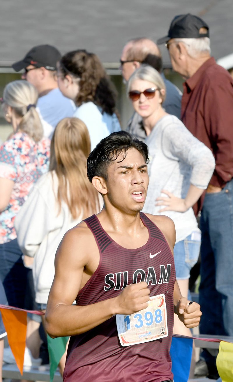 Bud Sullins/Special to the Herald-Leader Ricardo Montano was the top finisher for Siloam Springs at the Panther Cross Country Classic held Saturday on the grounds of Simmons Foods. Montano finished 14th overall with a time of 18 minutes, 18.48 seconds.