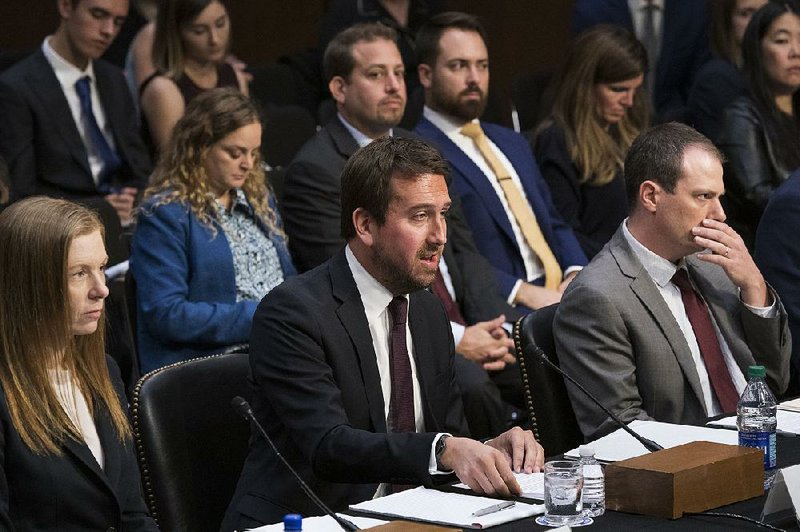 Monika Bickert (from left) of Facebook, Nick Pickles of Twitter and Derek Slater of Google testify Wednesday in a Senate Commerce Committee hearing.