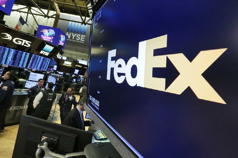 FedEx shares tumbled on the New York Stock Exchange on Wednesday after the delivery company lowered its outlook for the rest of the fiscal year. 