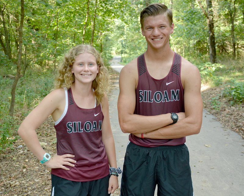 Graham Thomas/Herald-Leader Siloam Springs seniors Rebekah Rodgers (left) and Adam Kennedy are captains for their the respective cross country teams. Siloam Springs hosts its annual Panther Cross Country Classic on Saturday at the Simmons Course.