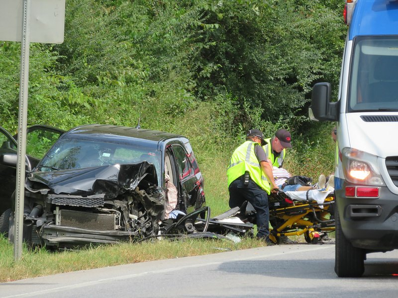 Westside Eagle Observer/RANDY MOLL A two-vehicle collision on Arkansas Highway 59 just north of the Gentry city limits about noon on Thursday (Sept. 19, 2019) sent at least two to the hospital and backed up traffic for an hour or more. The number of injured or the extent of their injuries was not yet released on Thursday evening.