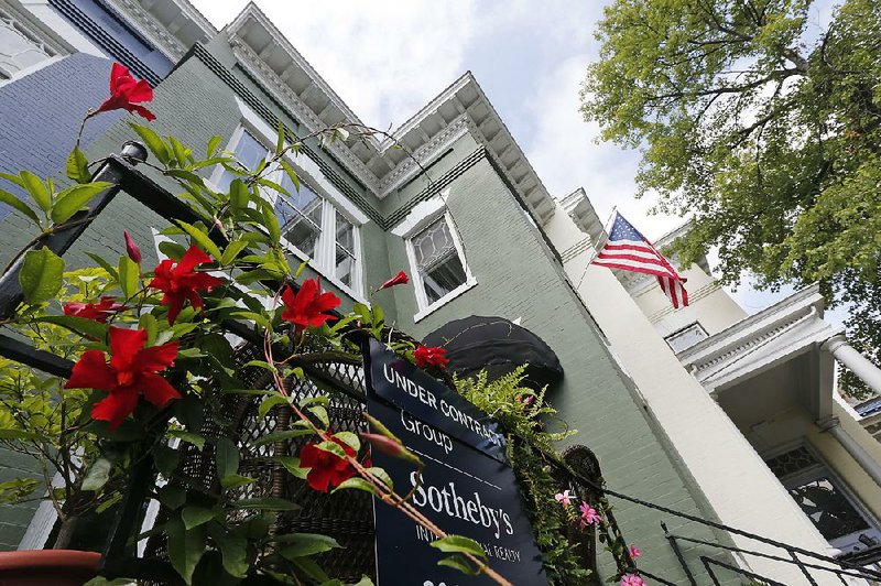 This home in Richmond, Va., was under contract for sale in August. Sales of existing U.S. homes rose last month to the highest level in more than a year, the National Association of Realtors reported Thursday. 