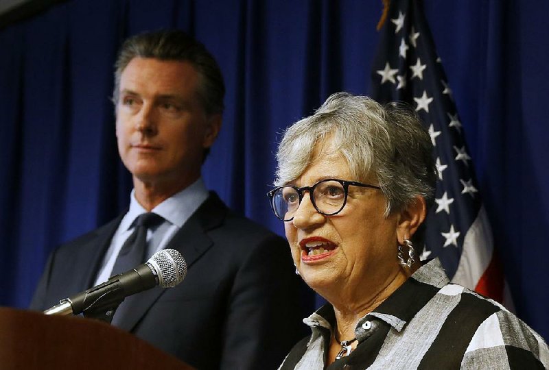 California Gov. Gavin Newsom and state Air Resources Board Chairman Mary Nichols talk earlier this week about the federal government’s plan to revoke the state’s authority over vehicle-emissions standards. After filing suit Friday, Nichols said, “This is the fight of a lifetime for us.” 