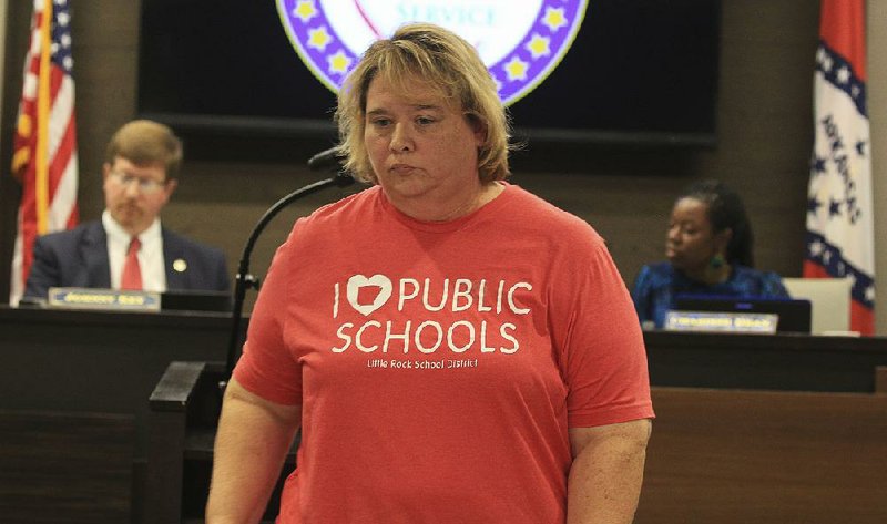 In this file photo Teresa Knapp Gordon, president of Little Rock Education Association, leaves the podium after speaking during a state Board of Education meeting.