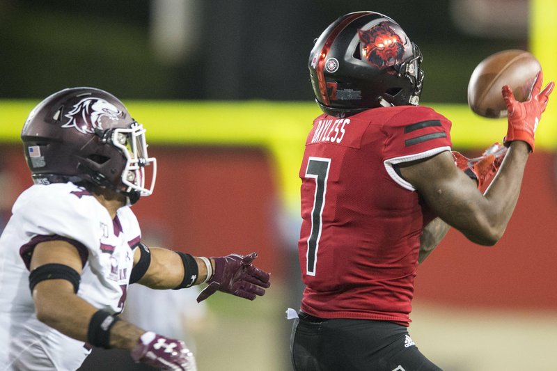 Arkansas State University's Omar Bayless reels in a long pass during the game against the Southern Illinois Salukis at Centennial Bank Stadium in Jonesboro on Sept. 21, 2019.