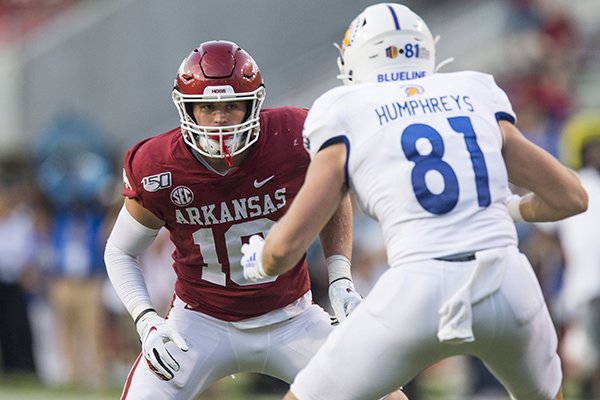 Arkansas linebacker Bumper Pool covers San Jose State tight end Billy Humphreys during a game Saturday, Sept. 21, 2019, in Fayetteville.