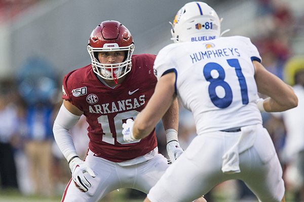 Arkansas linebacker Bumper Pool covers San Jose State tight end Billy Humphreys during a game Saturday, Sept. 21, 2019, in Fayetteville. 