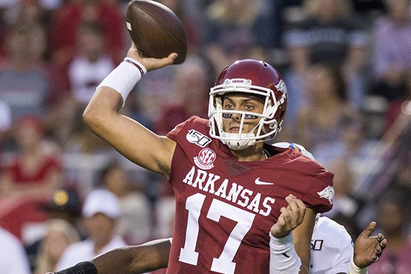 Arkansas quarterback Nick Starkel takes a snap during a game against San Jose State on Saturday, Sept. 21, 2019, in Fayetteville.