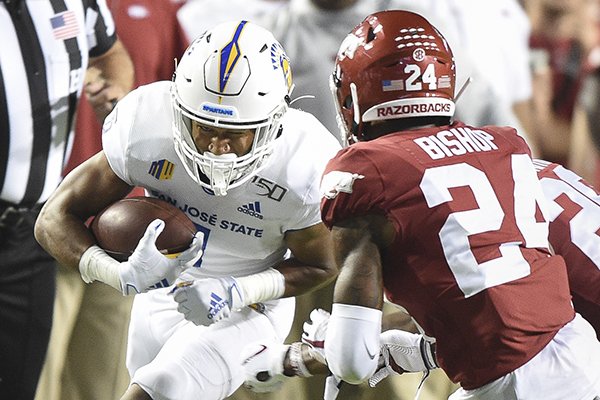 Arkansas defensive back LaDarrius Bishop pursues San Jose State receiver Isaiah Holiness during a game Saturday, Sept. 21, 2019, in Fayetteville. 