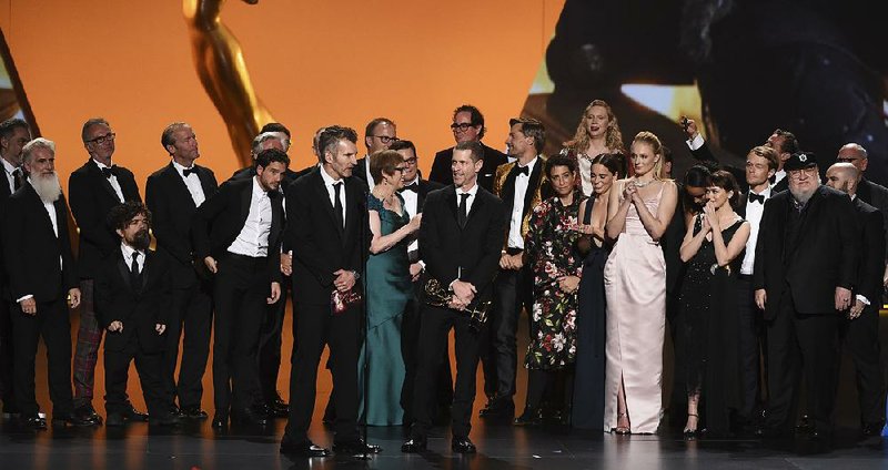 The team from Game Of Thrones accepts the award for outstanding drama series Sunday during the 71st Primetime Emmy Awards at the Microsoft Theater in Los Angeles.