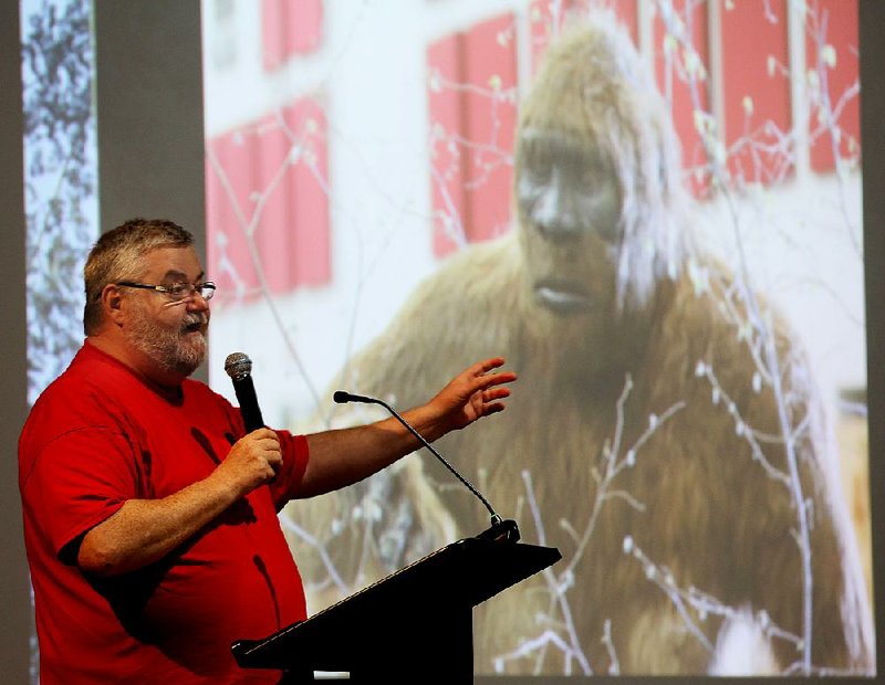 Robert Swain discusses reported Bigfoot sightings with attendees Saturday at the Arkansas Bigfoot Conference in Conway. 