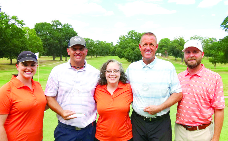 Winners: From left: Aimee Beebe - Tournament Chair; Chris Elia, Amanda Cooley - Public Relations Manager at SHARE Foundation; Billy Blackburn; and Dale Smart, Tournament Co-Chair. Photo provided