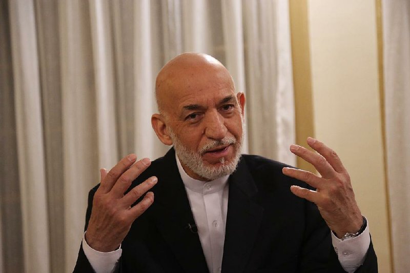 “We should first come to peace in Afghanistan and then conduct elections,” former Afghan President Hamid Karzai said Tuesday in Kabul. “We cannot conduct elections in a country that is going through a foreign-imposed conflict.” 