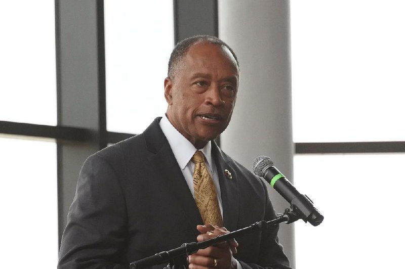 U.S. Marshals Service Director Donald Washington speaks at Tuesday’s dedication of the Samuel M. Sicard Hall of Honor and the Mary Carleton and Robert A. Young III Building at the Marshals Museum in Fort Smith. 