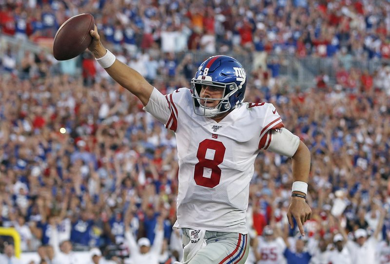 New York Giants quarterback Daniel Jones (8) runs 7-yards for a touchdown during the second half of an NFL football game against the Tampa Bay Buccaneers Sunday, Sept. 22, 2019, in Tampa, Fla. (AP Photo/Mark LoMoglio)