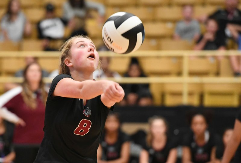 NWA Democrat-Gazette/J.T. WAMPLER Springdale's Maddie Downing gets a dig against Bentonville Tuesday Sept. 24, 2019 at Tiger Arena in Bentonville. The Tigers won the match in three sets, 25-16, 25-20 and 25-14.