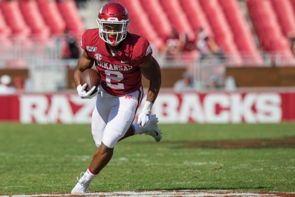 Chase Hayden, Arkansas running back, carries in the second quarter vs Colorado State Saturday, Sept. 14, 2019, at Reynolds Razorback Stadium in Fayetteville.