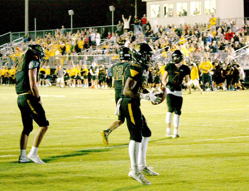 Prairie Grove senior fullback Keiandre Hobbs, shown with the ball, ran in a 4-yard touchdown as time expired in the first half during Friday’s game against Pottsville.
