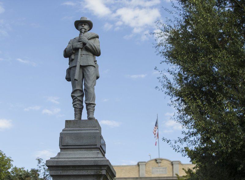 The Confederate soldier monument Wednesday, Sept. 25, 2019, on the Bentonville square. The lower part of the soldier's rifle is missing after the statue was vandalized. 