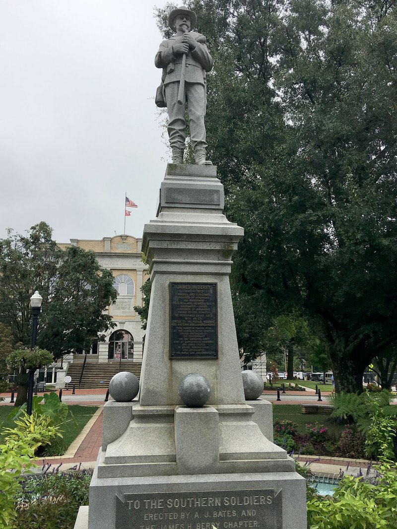 NWA Democrat-Gazette/MIKE JONES The Confederate statue Thursday, Sept. 26, 2019 on the Bentonville square. A part of the statue's rifle was removed and is missing.