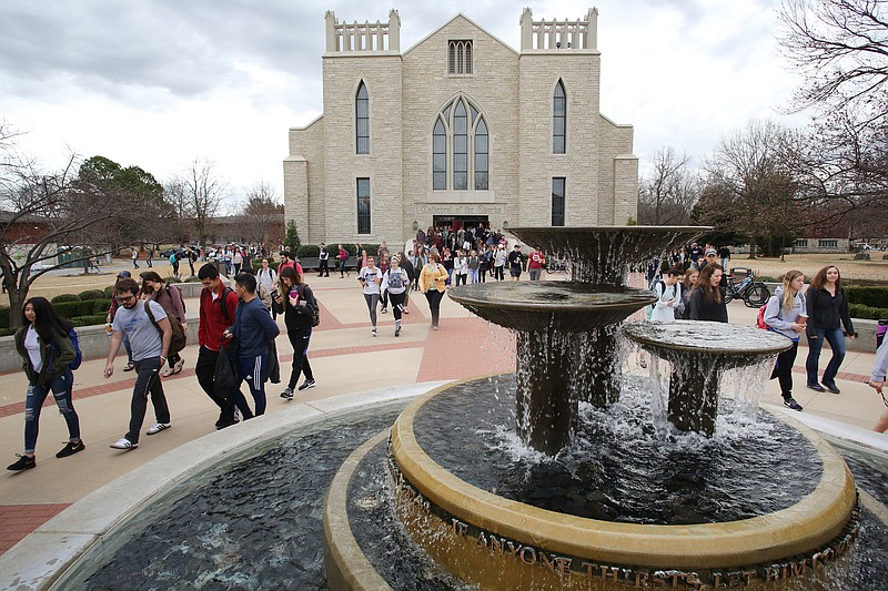 Students leave the Cathedral of the Ozarks Tuesday, February 27, 2018, on the campus of John Brown University following chapel in Siloam Springs.

