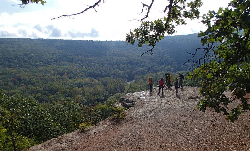 Hikers enjoy stunning views of Devil's Den State Park and the Lee Creek valley on Saturday, Oct. 12, 2013, from an overlook along the Yellow Rock Trail.