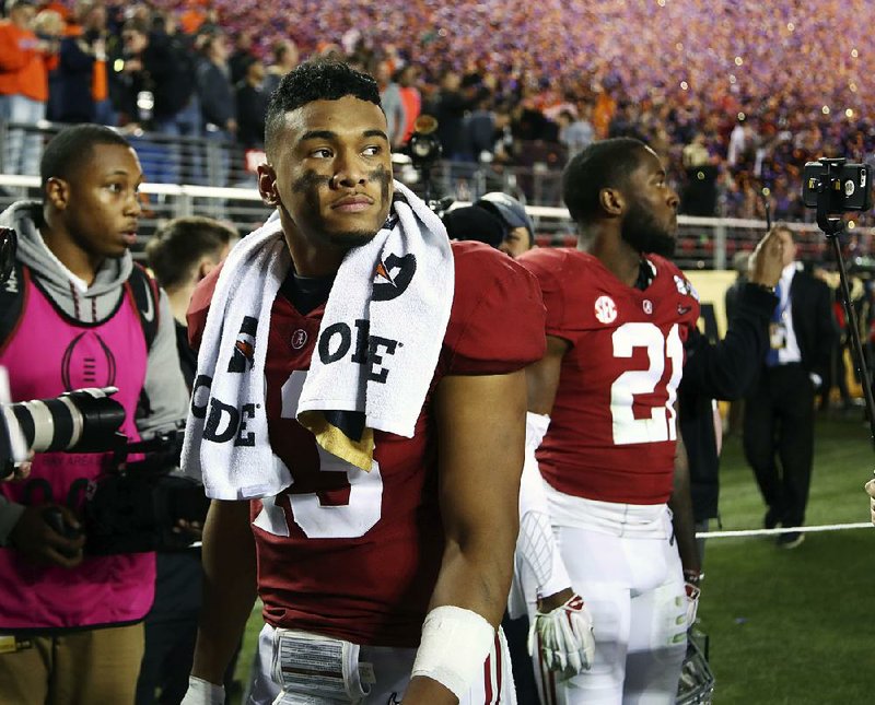Alabama's Tua Tagovailoa reacts after an NCAA college football playoff championship game against Clemson in Santa Clara, Calif. Alabama’s lengthy run of dominance already ranks among the most impressive dynasties in college football history.