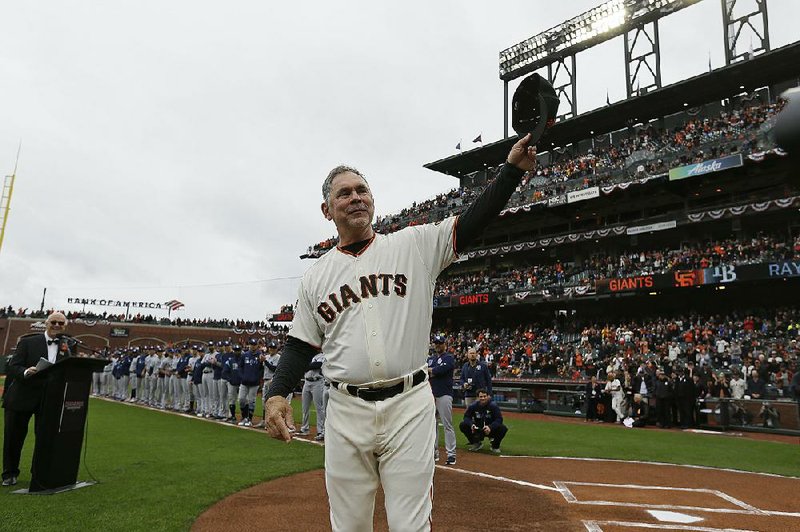 San Francisco Giants Manager Bruce Bochy tips his cap to the crowd during introductions before the team’s April 5 game against the Tampa Bay Rays. Bochy will manage his last game Sunday, as he is retiring after a decorated 25-year managerial career highlighted by three World Series titles in a five-year span with the Giants. 