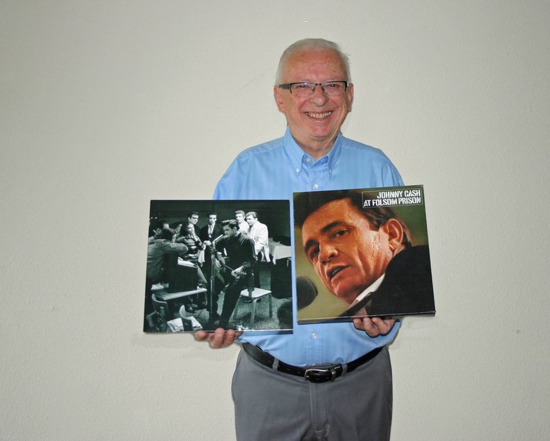 Photo courtesy Marilu Guevara
 Journalist Gene Beley poses with the "Johnny Cash at Folsom Prison" album from 1968.