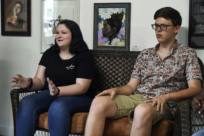 Youth Advisory Council members Izzy Saettele, left, and Robert Neilson recently discussed their group's purpose at Cutwell 4 Kids. - Photo by Grace Brown of The Sentinel-Record