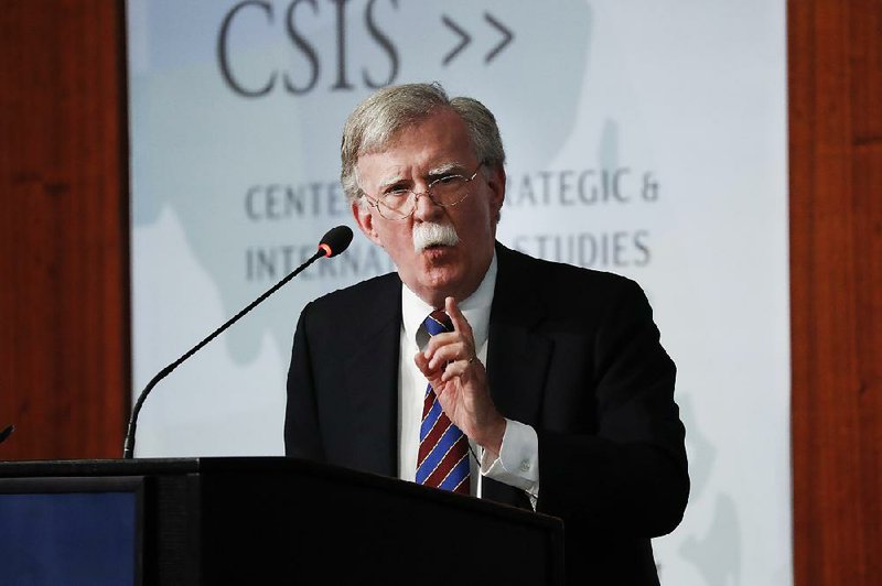 FILE — Former national security adviser John Bolton gestures while speaking at the Center for Strategic and International Studies in Washington in September.