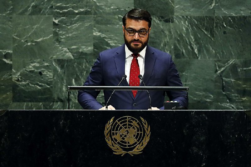 Afghan National Security Adviser Hamdullah Mohib addresses the 74th session of the United Nations General Assembly on Monday. For more photos, go to arkansasonline.com/101chair/ 