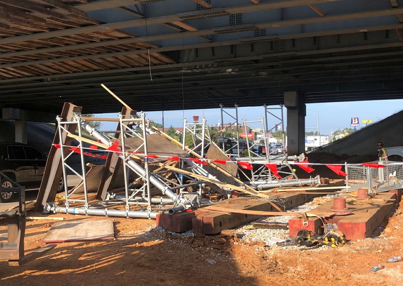 COURTESY PHOTO ARKANSAS DEPARTMENT OF TRANSPORTATION Scaffolding under a bridge on Interstate 49 and Walnut Street.