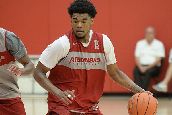 Arkansas guard Mason Jones (15) drives to the lane Thursday, Sept. 26, 2019, as guard Isaiah Joe defends during practice in the Eddie Sutton Gymnasium inside the Basketball Performance Center in Fayetteville.