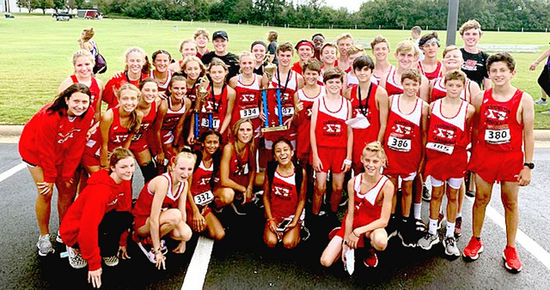 Travis Kegans Special to the Enterprise-Leader/Farmington's cross country teams competed at the Shiloh Saints Invitational Sept. 21 with senior Kolby Gardner winning the boys race. At Shiloh, the junior high boys ran a two mile course taking the team trophy with Gavin Spurlock third and Cody Klotzbeucher 12th. The junior high girls captured the Runner-up team trophy led by Jordyn Paine in seventh place; Addie Kaiser, 12th; and Gabby McBurnett, 14th.