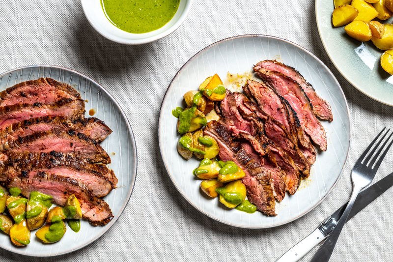 For The Washington Post/LAURA CHASE DE FORMIGNY Cumin-Rubbed Flank Steak With Chimichurri Potatoes