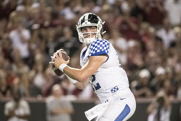 Kentucky quarterback Sawyer Smith (12) looks for an open receiver against South Carolina during the second half of an NCAA college football game Saturday, Sept. 28, 2019, in Columbia, S.C. South Carolina defeated Kentucky 24-7. (AP Photo/Sean Rayford)


