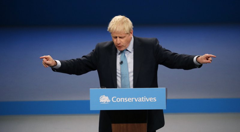 Britain's Prime Minister Boris Johnson delivers his Leader's speech at the Conservative Party Conference in Manchester, England, Wednesday, Oct. 2, 2019. Britain's ruling Conservative Party is holding their annual party conference. (AP Photo/Frank Augstein)

