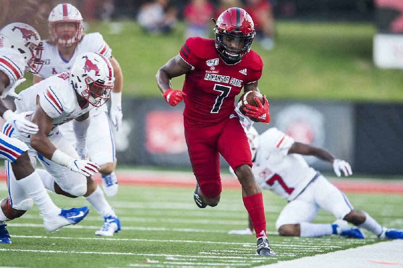 Arkansas State wide receiver Omar Bayless is the nation’s leading  receiver with 689 yards, 1 yard ahead of Liberty’s Antonio Gandy-Golden. 