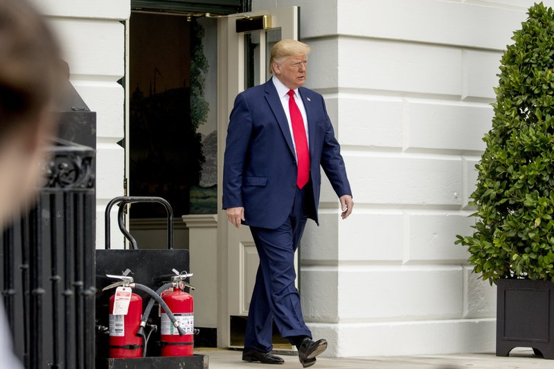 President Donald Trump walks out of the White House to speak to the media on the South Lawn in Washington, Thursday, Oct. 3, 2019, before boarding Marine One for a short trip to Andrews Air Force Base, Md., and then on to Florida. (AP Photo/Andrew Harnik)

