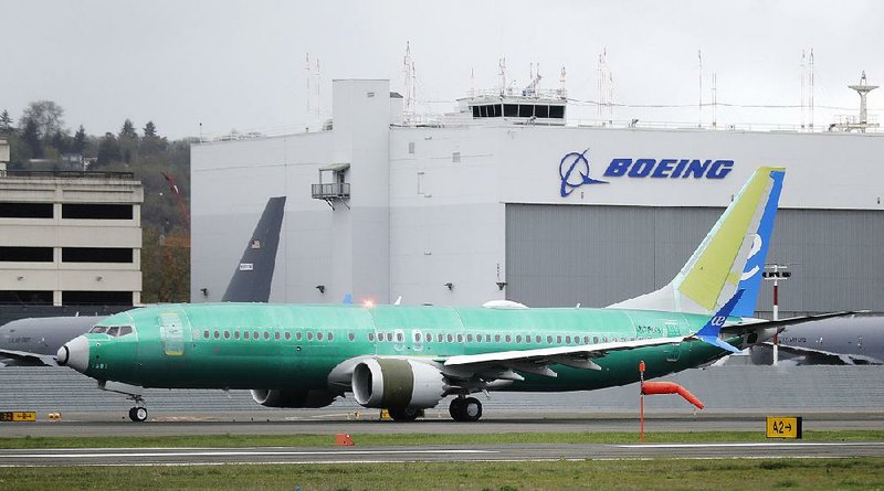 A Boeing 737 Max 8 airplane rolls toward takeoff in April before a test flight at Boeing Field in Seattle. 