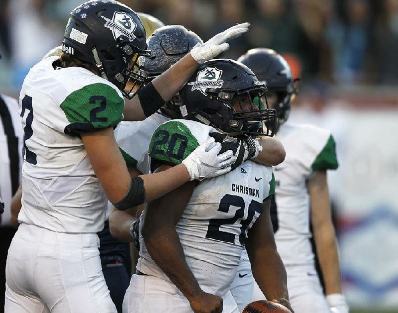 Little Rock Christian running back Kendel Givens celebrates after scoring his second touchdown against Pulaski Academy in the Class 5A state championship game on Dec. 2, 2018, at War Memorial Stadium in Little Rock. Little Rock Christian defeated Pulaski Academy after six consecutive losses in the series. 