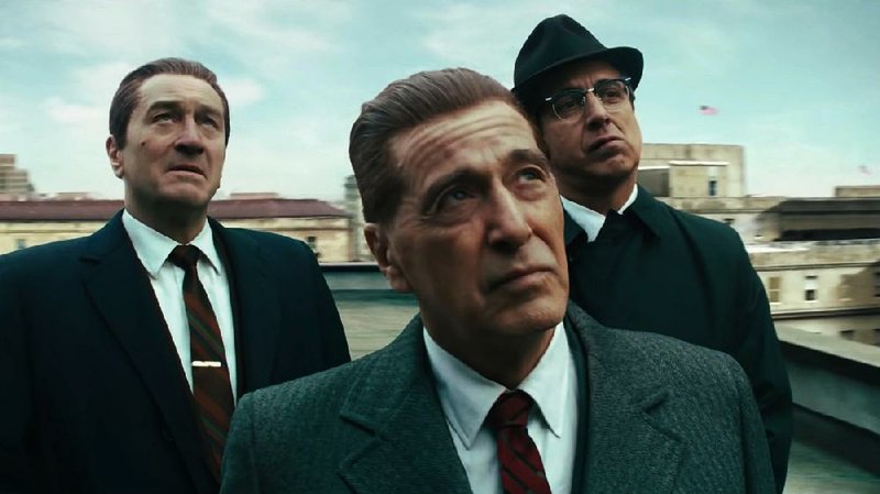 Robert De Niro (left) and Al Pacino (center) were digitally de-aged to play, respectively, mob-connected union officials Frank Sheeran and Jimmy Hoffa in Martin Scorsese’s The Irishman. Ray Romano plays Teamster lawyer Bill Bufalino, brother of the boss of the Northeastern Pennsylvania crime family. 