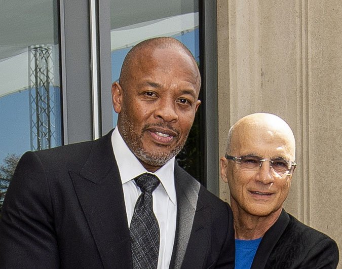 Recording artist Andre "Dr Dre" Young (left) and record producer Jimmy Iovine cut the ribbon at the official opening and dedication of Iovine and Young Hall at the University of Southern California campus in Los Angeles, Wednesday, Oct 2, 2019. 