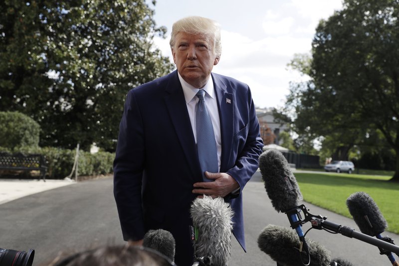 President Donald Trump talks to reporters on the South Lawn of the White House, Friday, Oct. 4, 2019, in Washington. (AP Photo/Evan Vucci)


